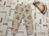 Nutmeg 2 -3 év 92 -98  cm tejeskávé alapon virág-róka-süni  mintás pamut lány nadrág- újszerű,hibátlan