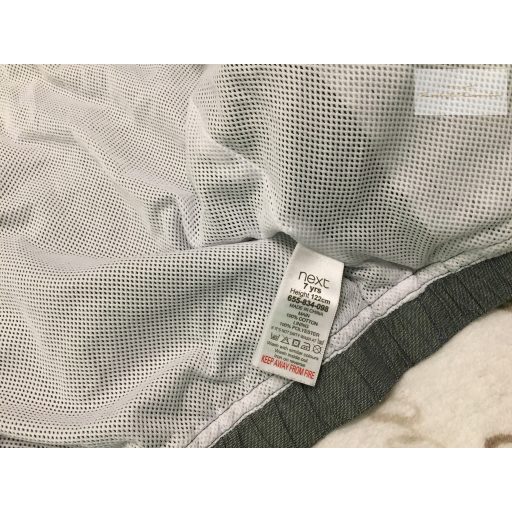 Next 7 év 122 cm  szürke - narancssárga szél és vízálló fiú átmeneti kabát/ széldzseki - újszerű, hibátlan