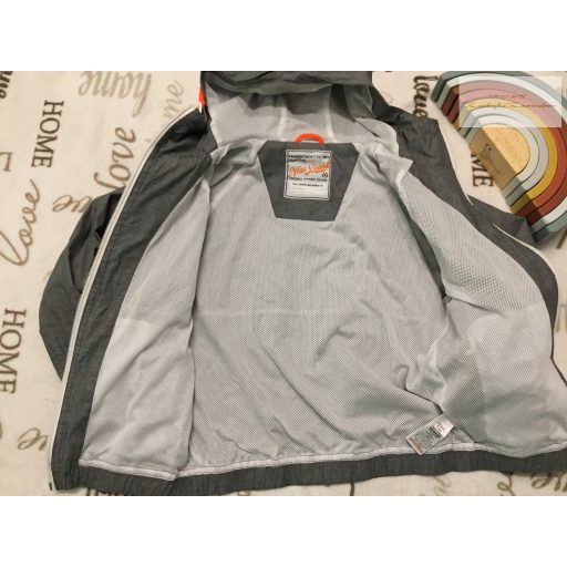 Next 7 év 122 cm  szürke - narancssárga szél és vízálló fiú átmeneti kabát/ széldzseki - újszerű, hibátlan