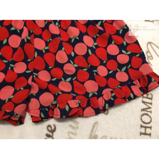 Next 9 év 134 cm kék, piros - rózsaszín gyümölcs mintás vékony anyagú lány playsuit - újszerű,hibátlan