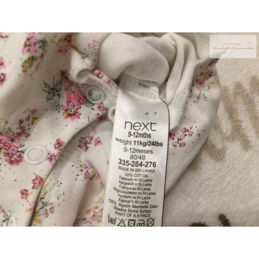 Next 9-12 hó 11 kg  fehér, apró virágmintás pamut lány playsuit/ napozó- újszerű,hibátlan